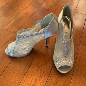 Silver lace and rhinestone peep toe pumps